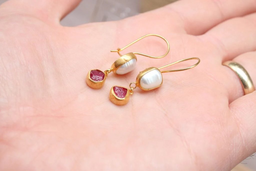 pearl and raw ruby silver